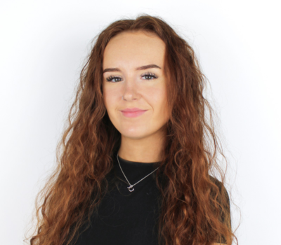 Phoebe Neil, Trainee Recruitment Consultant, wearing black top with white background, photo taken at Prime Appointments in Witham 2